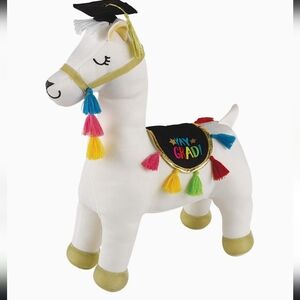 White and Red Stuffed Animal with Graduation Cap